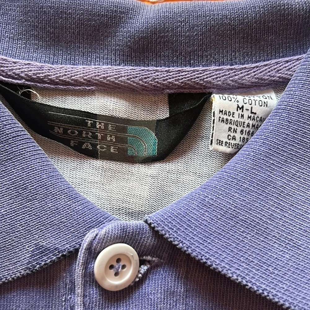 The North Face lavender short sleeved polo SZ M/L